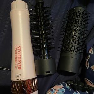 Blow dryer with different brush extensions